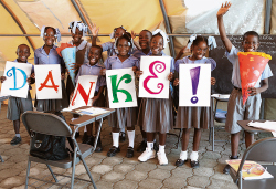 Children in Gressier, Haiti, have reason to be upbeat again. The WACKER RELIEF FUND is supporting the reconstruction of this elementary and high school that was destroyed in the earthquake. (photo)