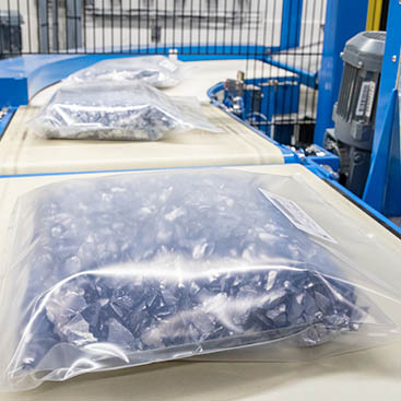 The polysilicon chunks are packaged in plastic film in the cleanroom and then sent to customers.